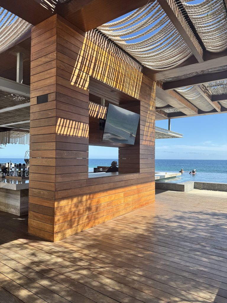 Location: Solaz, Cabo San Lucas, Baja California Wood Highlights: Semi-covered wood decking, wood cladding at wall and soffit structure