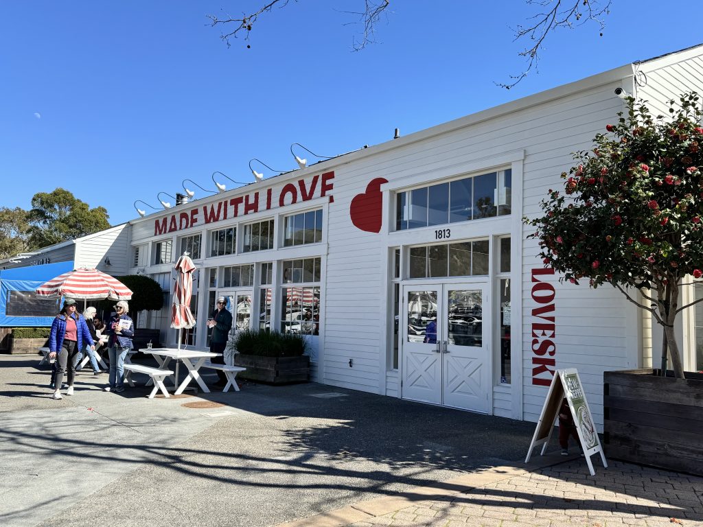 Photo credit: MetaphorDesign.com, Location: Loveski Deli, Larkspur, California, Wood Highlights: Exterior siding with painted graphics and custom trim