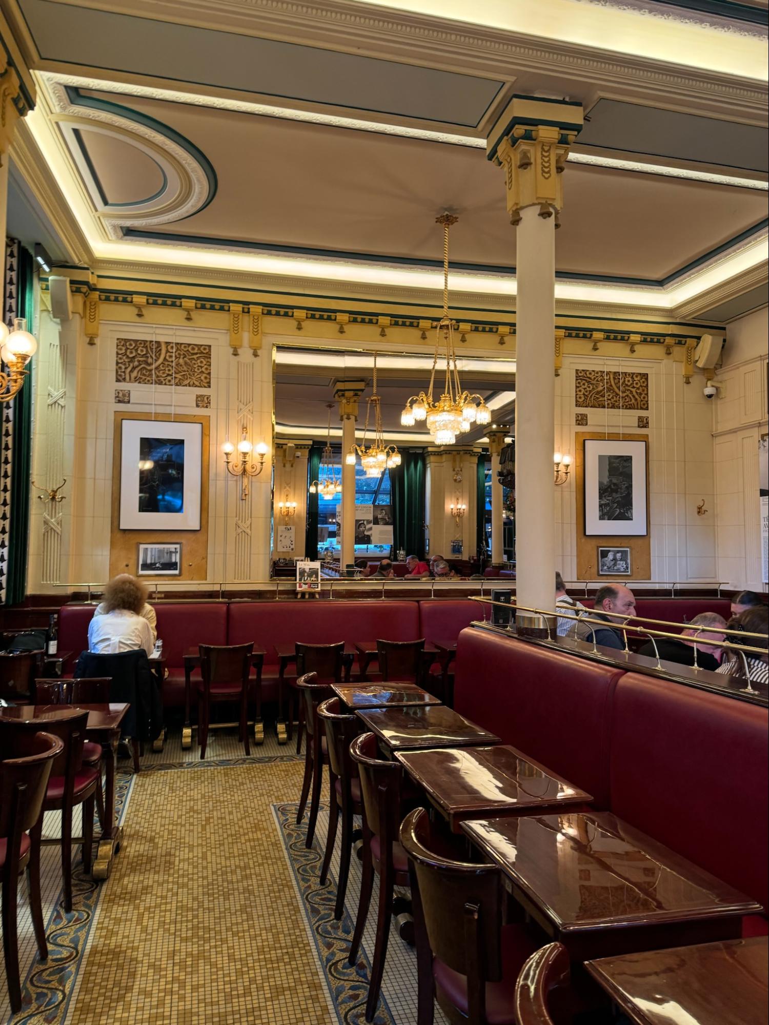 Location: Restaurant Les Deux Magots, Paris, FranceWood Highlights: Trim at ceiling placed to hold and frame recessed lighting