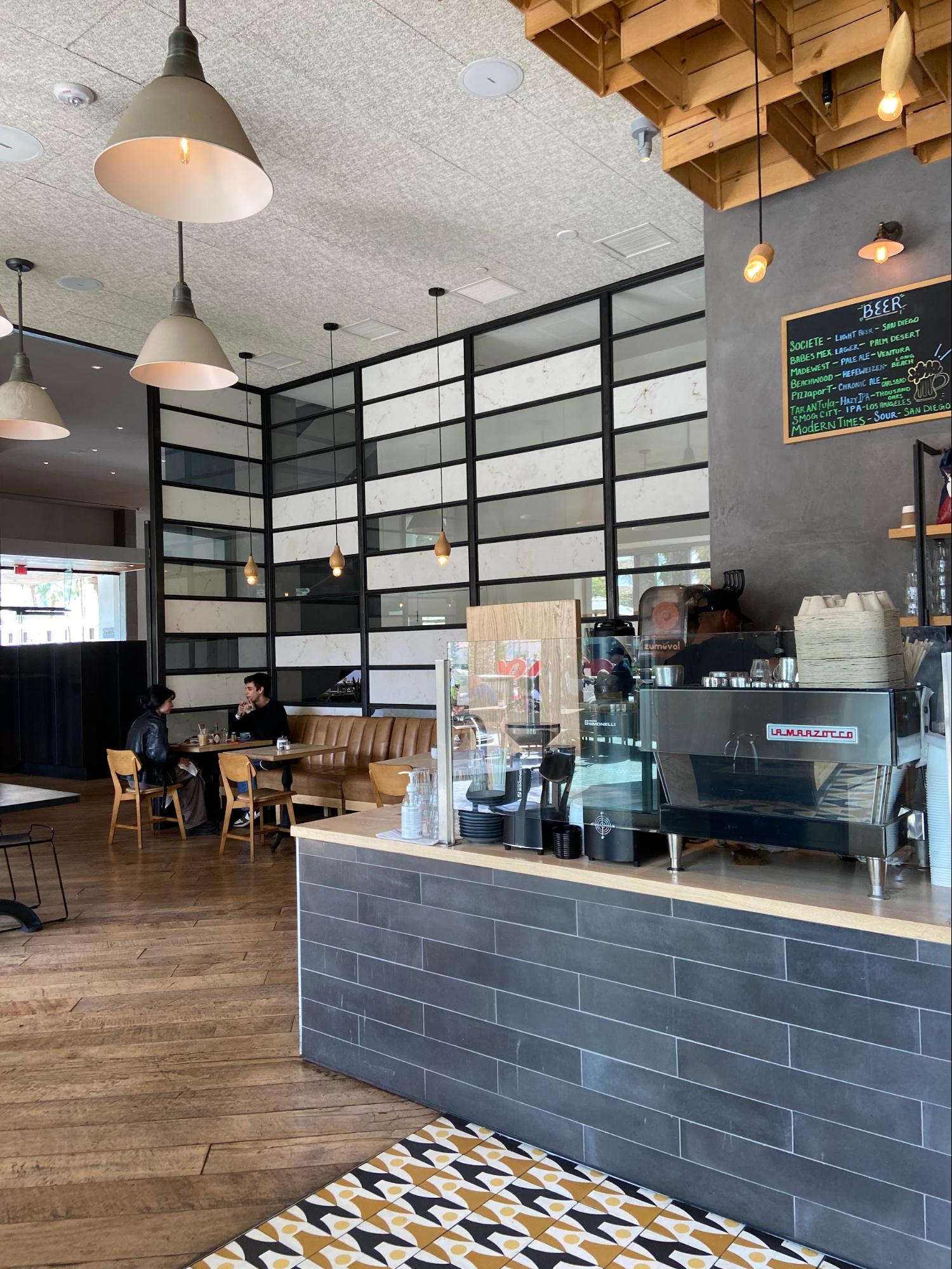 Location: Restaurant Juniper Table, Palm Springs, California, Wood Highlights: Oak wood flooring, diagonal layout, paired with tile