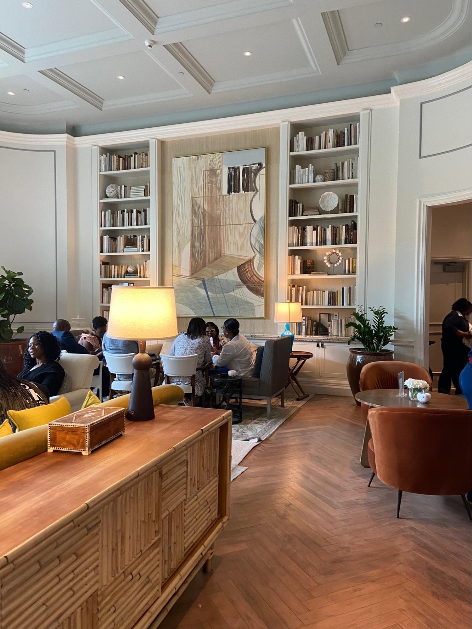 Location: The Library at Rosewood Baha Mar, Nassau, Bahamas, Wood Highlights: Trim at shelving edges, vertical trim