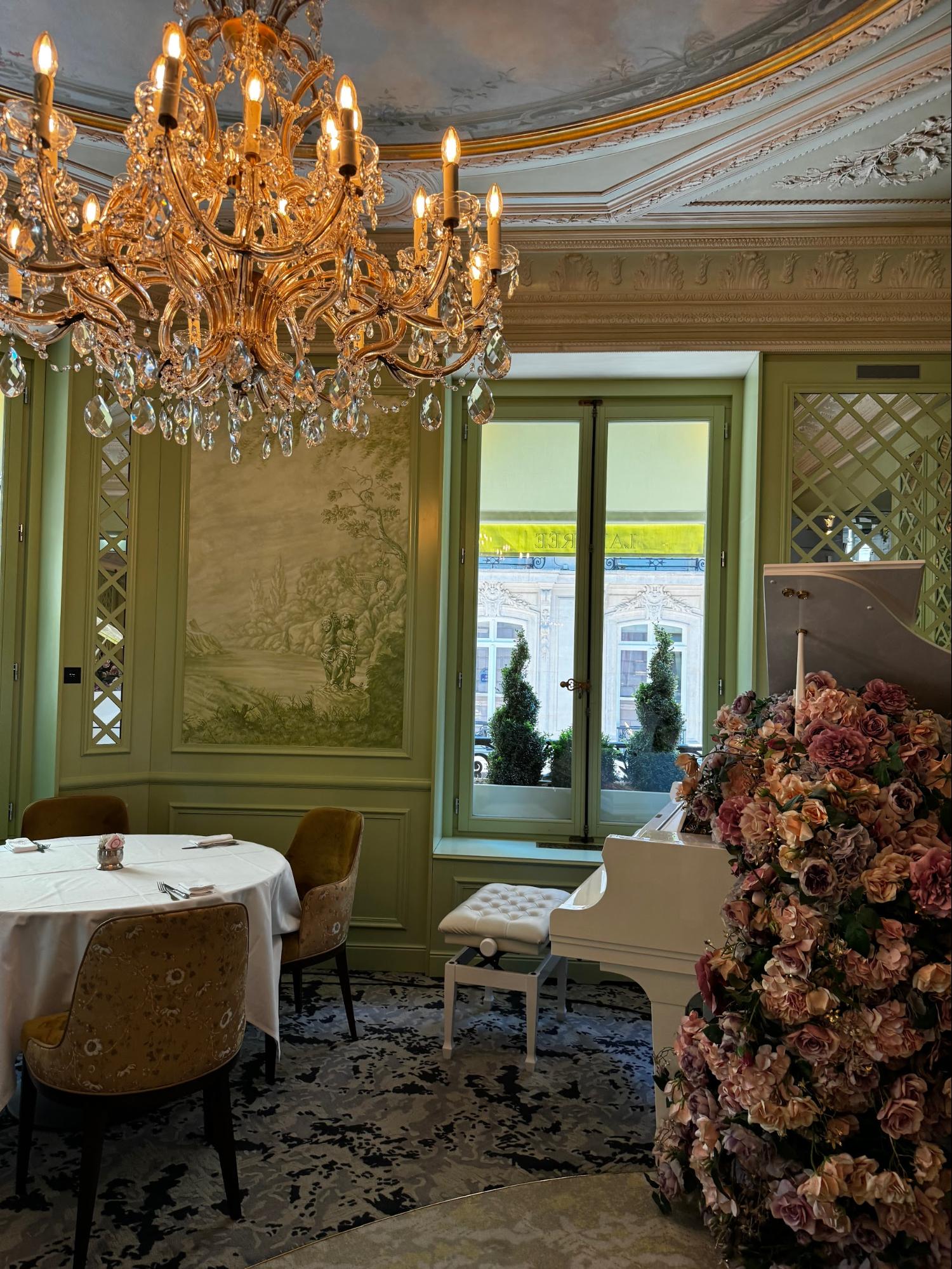 Location: Laduree Restaurant, Paris, France Wood Highlights: Trim at ceiling placed to highlight surface mounted light fixture with recessed lighting