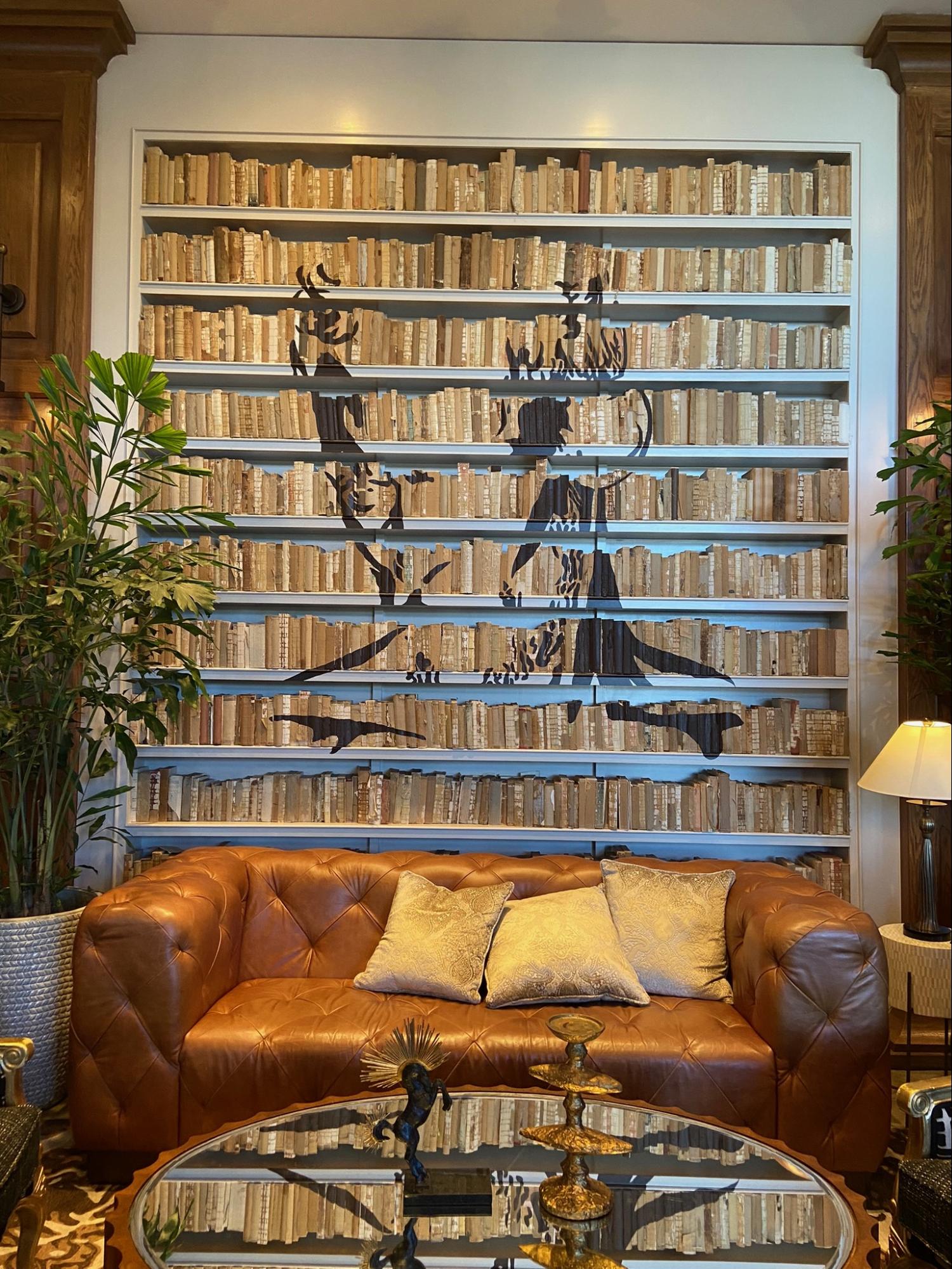 Location: The Ben, West Palm Beach, Florida, Wood Highlights: Moulding trim curved profile at shelving