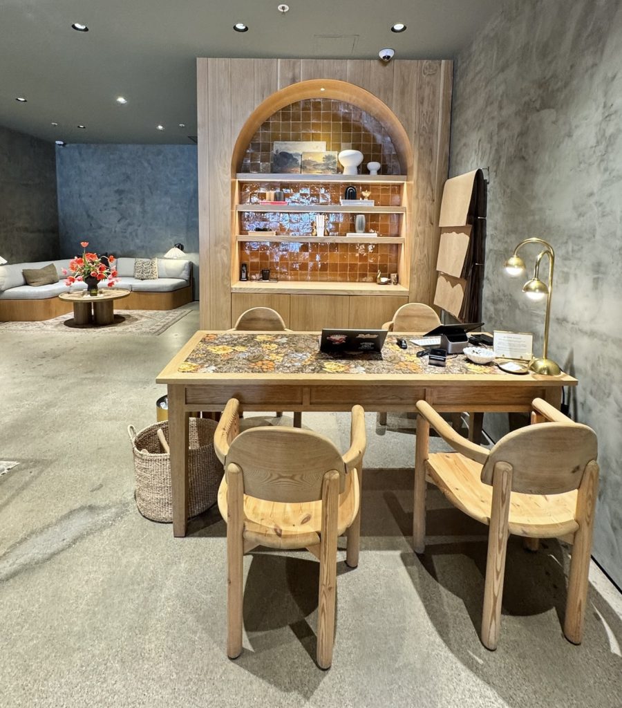 Location: The Great, Marin Country Mart, Wood Highlights: Natural wood trim at checkout desk and wood T&G backdrop design form a cohesive and memorable experience