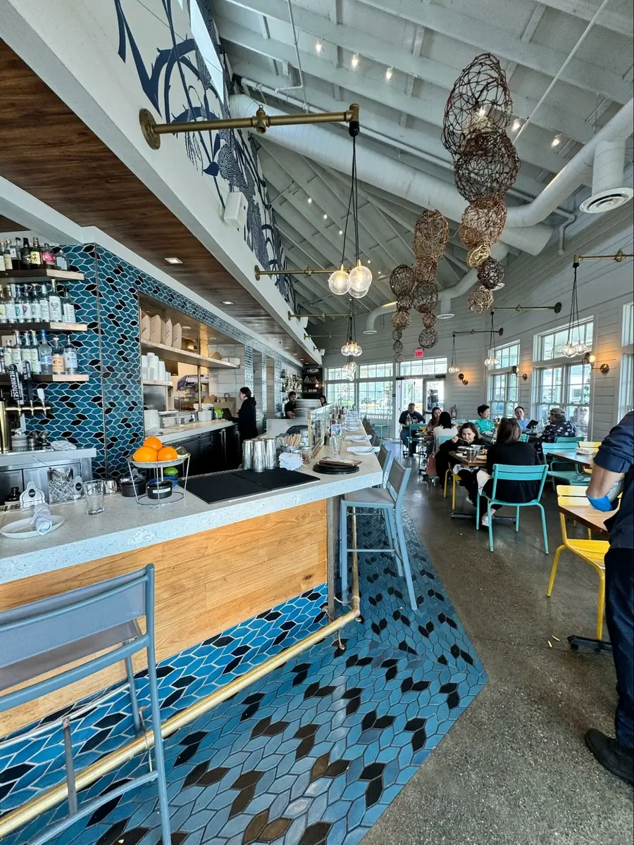 Location: Hog Island Oyster Company, Larkspur Landing, California, Wood Highlights: Wood trim at face of bar, wood at soffit
