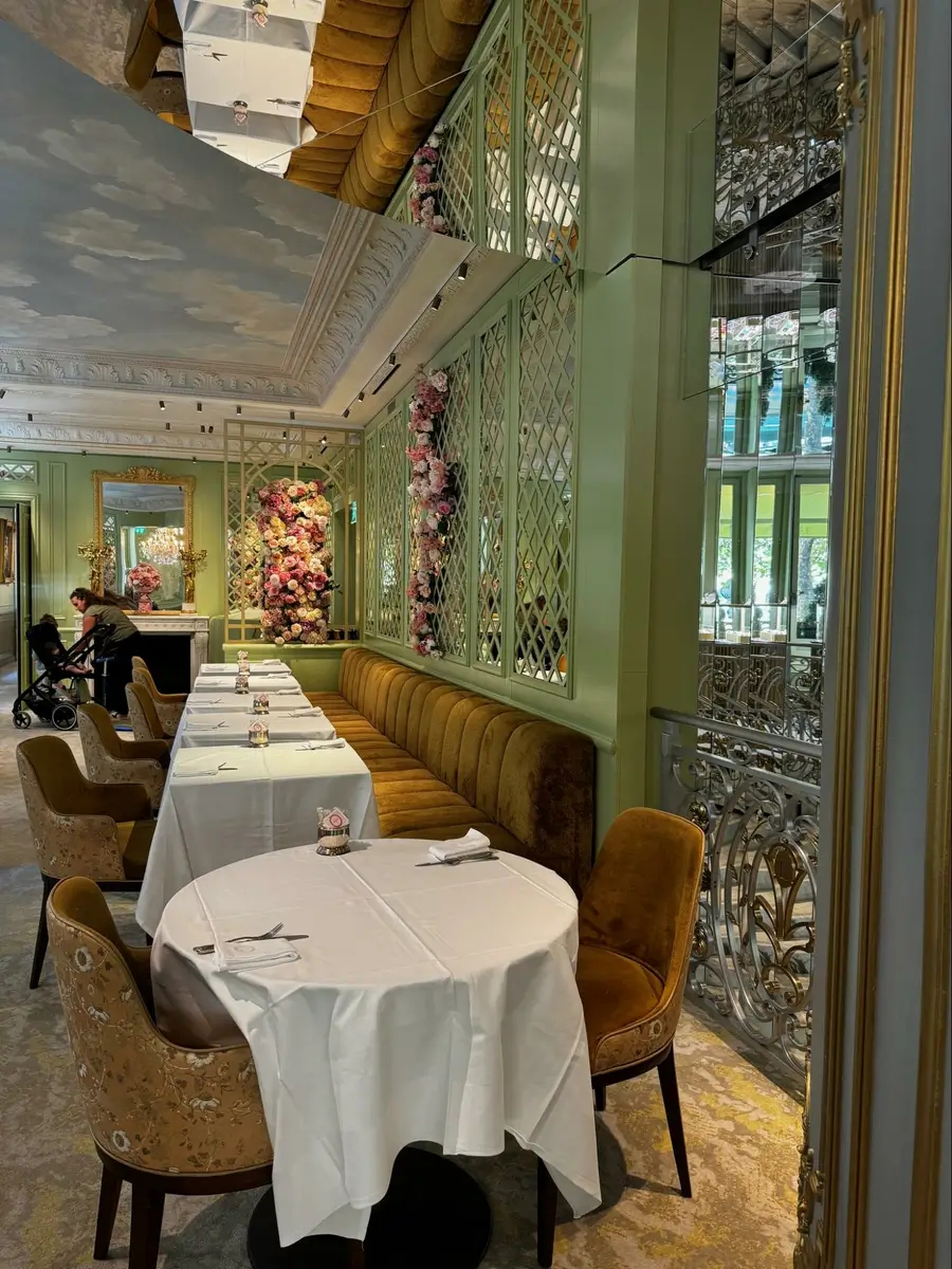 Location: Laduree Cafe, Paris, France, Wood Highlights: Mint painted architectural trim moulding design at banquette seating and ceiling