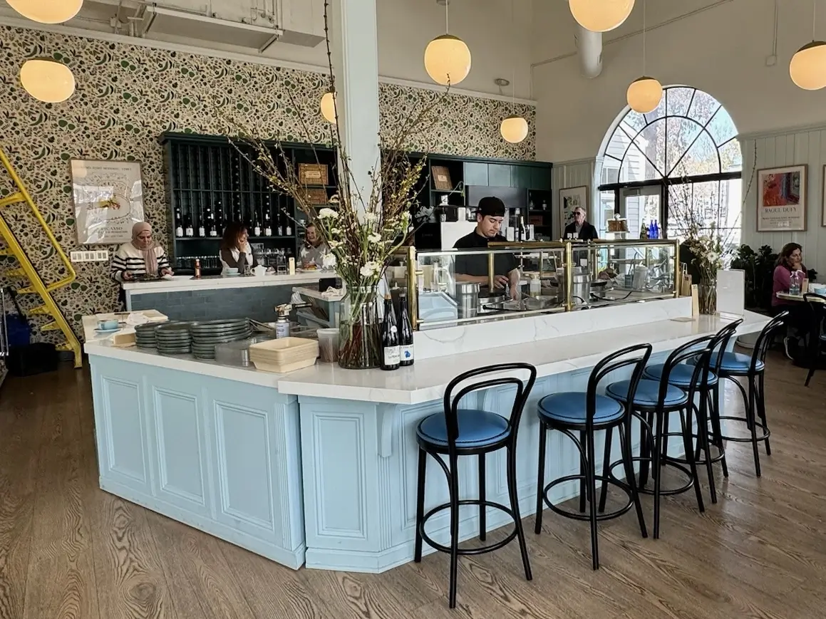 Location: Buvette du Marias, Larkspur, California, Wood Highlights: Light blue painted wood trim at crepe bar