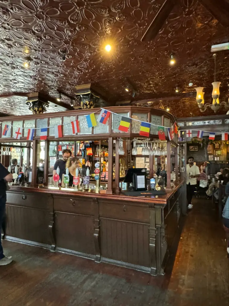 Location: The Clachan, London, England, Wood highlights: classic wood trim and Victorian details at bar design