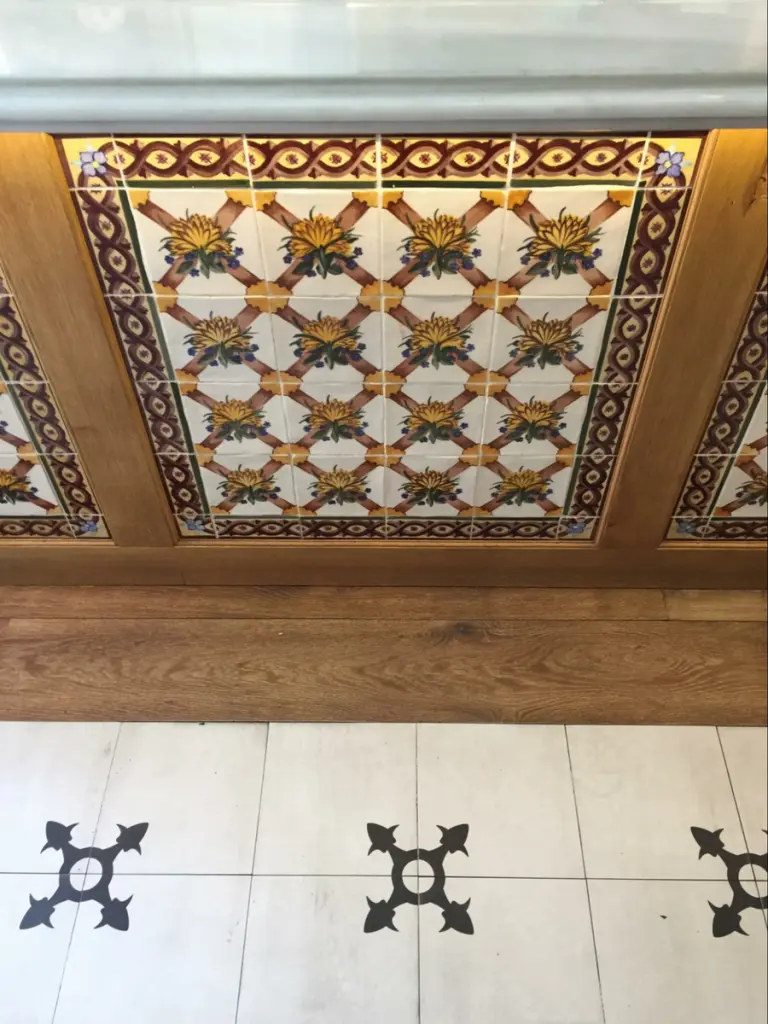 Location: Bar area, El Born, Barcelona, Spain, Wood Highlights: White oak wood trim at tile