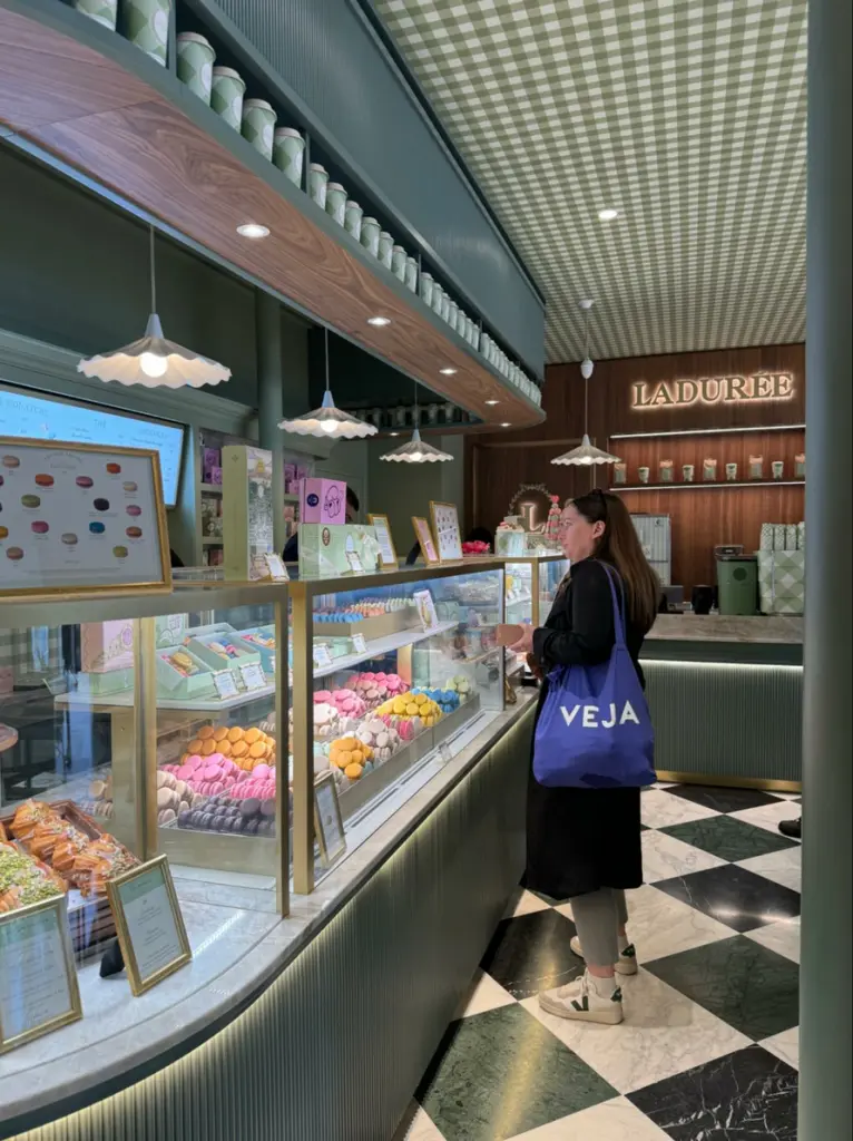 Location: Laduree, Paris, France Wood Highlights: Painted and natural wood design elements at service counter