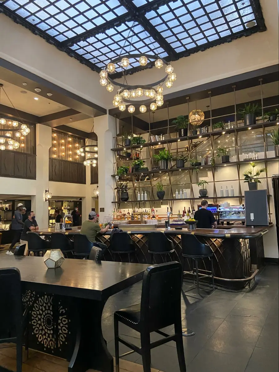 Location: Bar Figueroa, L.A., California, Wood Highlights: Warm dark wood trim at face of bar and wood edge at counter