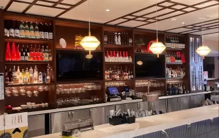 Location: Benihana, San Mateo, California Wood Highlights: Walnut S4S installed at ceiling and bar