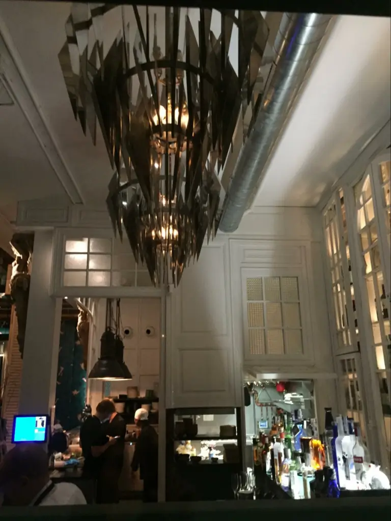 Location: Restaurant, El Born, Barcelona, Spain, Wood Highlights: Painted wood trim at bar area
