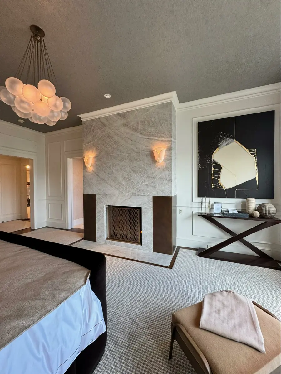 Location 2025 Decorator Showcase, San Francisco, California, Wood Highlights: wood crown moulding, baseboards, wood trim, window casing, door casing, wood flooring with carpet