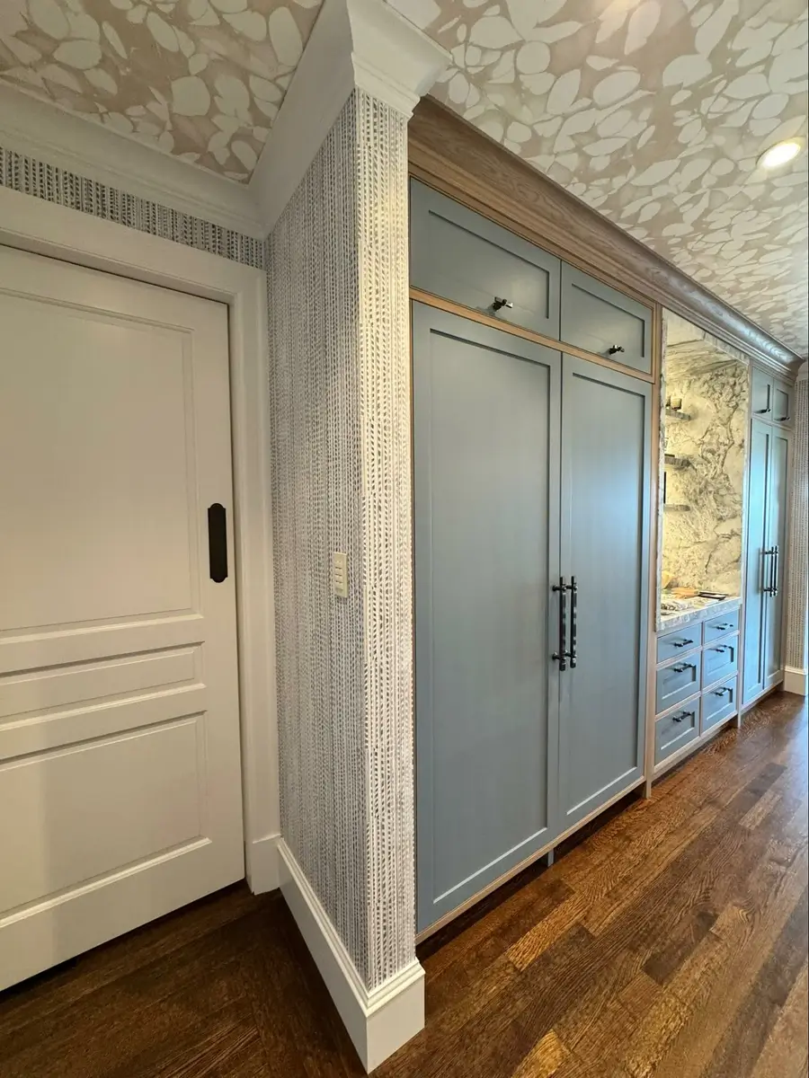 Location: San Francisco, California, Wood Highlights: Crown moulding, cabinetry trim, door casing, baseboards, flooring