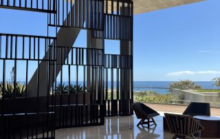 Location: Baja California Wood Highlights: Large scale screens in open air lobby