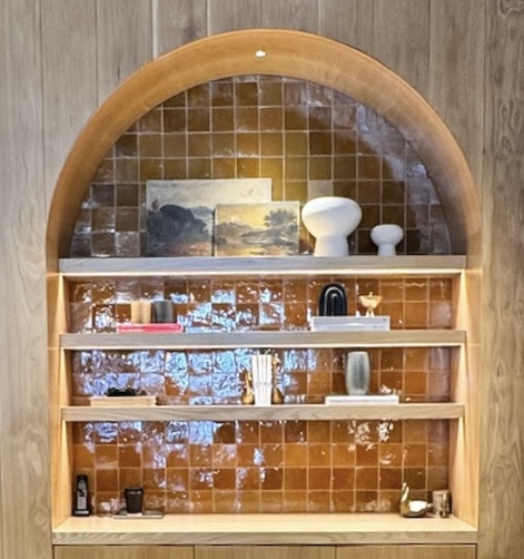 Location: Marin Country Mart, California, Wood Highlights: S4S at arched shelving niches, surrounding wall treatment