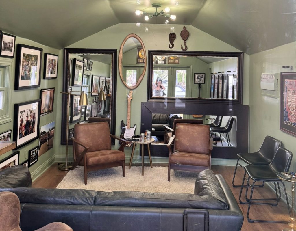 Location: BR Cohn Winery, California, Wood Highlights: Classic painted wood baseboards anchor this rock memorabilia private lounge