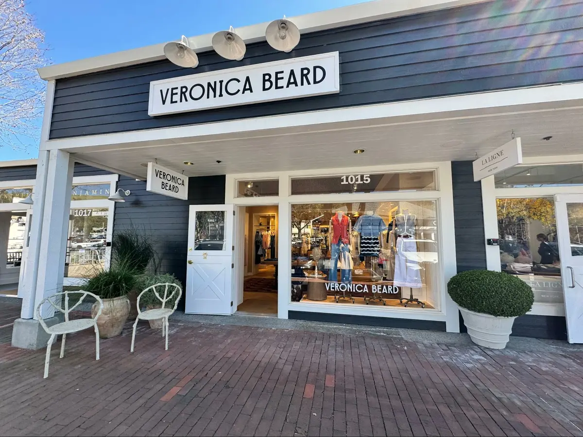 Location: Veronica Beard, Marin Country Mart, Marin County, California, Wood Highlights: Painted flat edge moulding, dark painted siding
