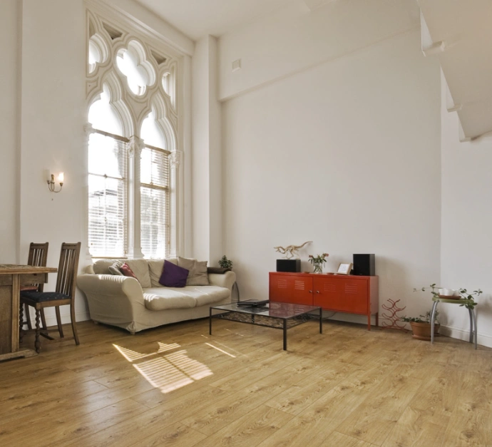 Photo inspired by literature with gothic rooms Moulding Highlights: Trim at windows, baseboard, tongue and groove flooring