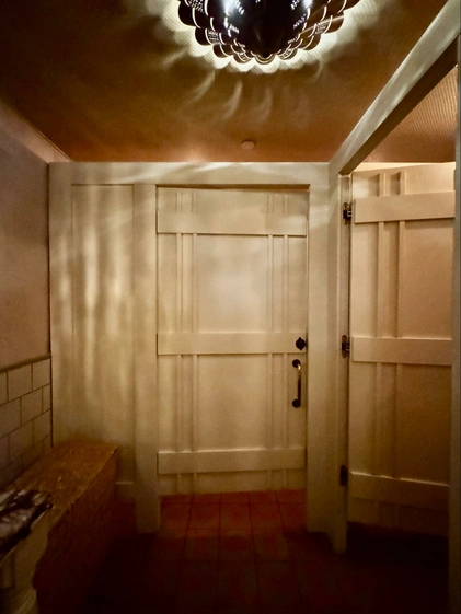 Location:, Bungalow Kitchen, Belvedere, California, Wood Highlights: Wood door trim design on face of doors at restroom