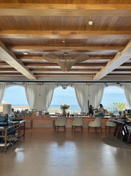 Photo credit: MetaphorDesign.comLocation: Lobby Island Bar, The Four Seasons, Cabo San Lucas, Mexico Moulding Highlights: Wood baseboard, trim at island, wood ceiling