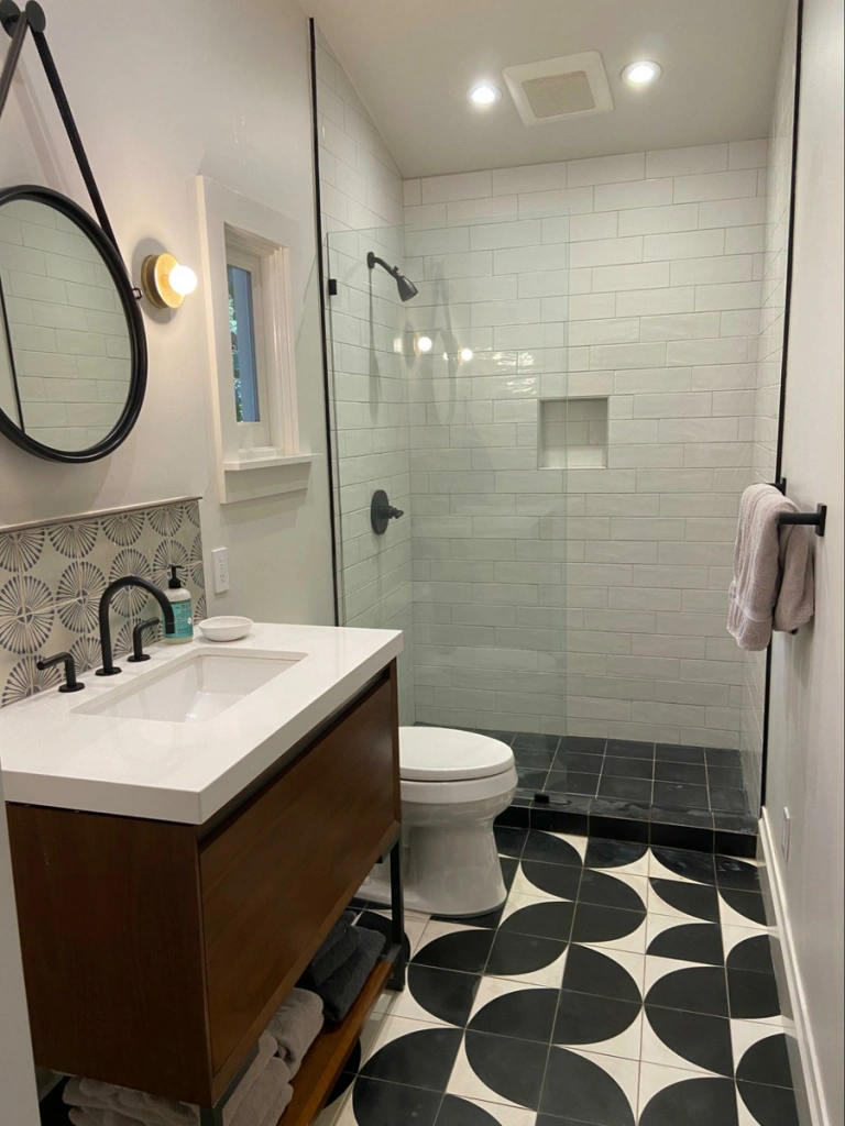 Photo credit: Metaphor Design, Location: Marin County, California, Wood Highlights: Custom baseboards, window trim, window sill in ADU bathroom