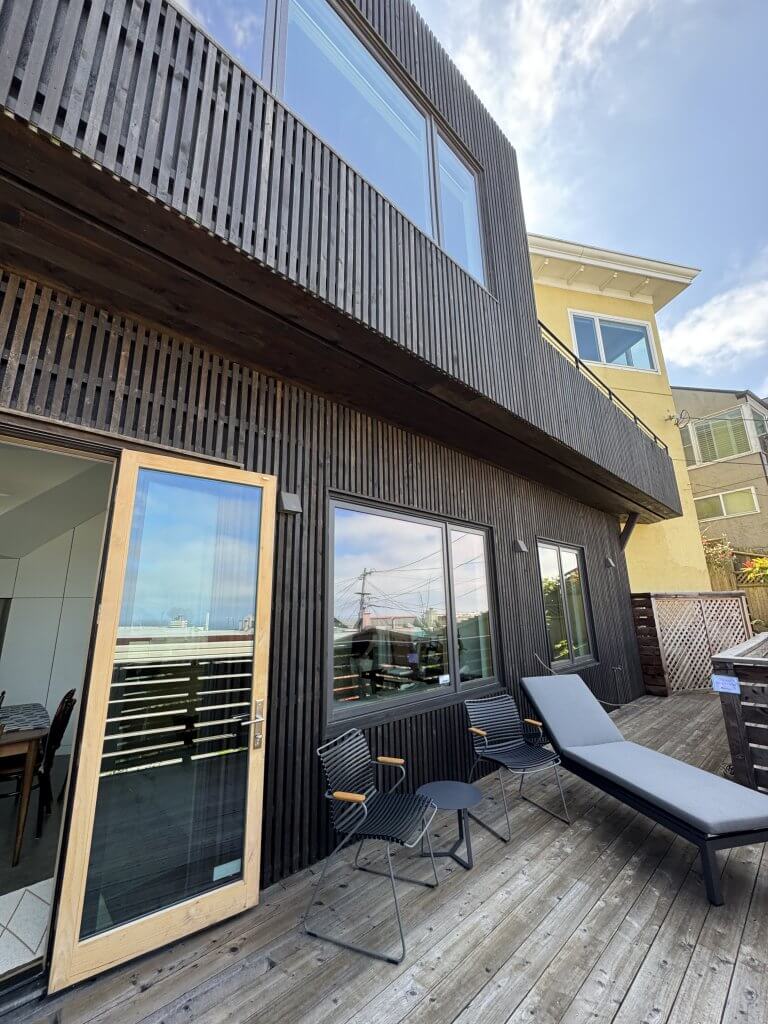 Location: Grandmother’s House, San Francisco, California, Wood Highlights: Contemporary exterior S4S at rear of facade including a continuous wide balcony projection, exterior rear decking, guardrail caps, perimeter fencing, on the AIASF Home Tour, addition designed by architecture firm Felix Associates