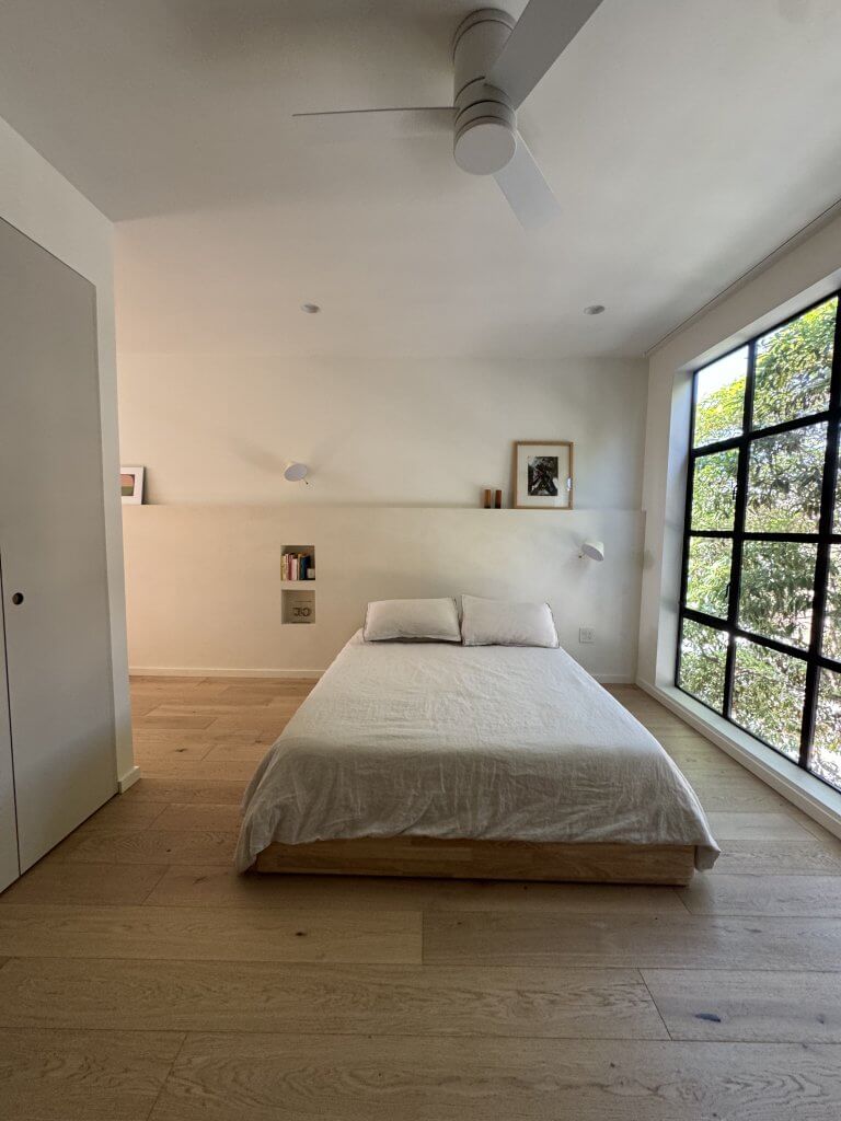 Location: Hayes Valley House, San Francisco, California, Wood Highlights: Wide plank white oak floors with painted low height baseboards create a warm yet strong contemporary minimalistic design with a calming effect, on the SFAIA Home Tour