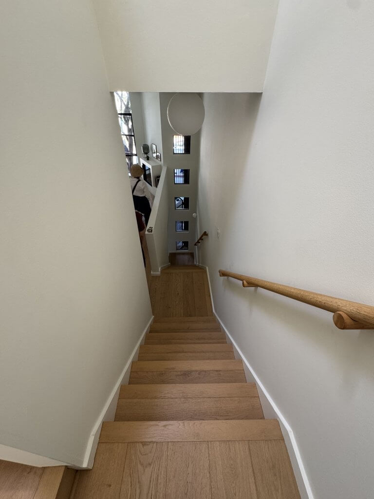 Location: Hayes Valley House, San Francisco, California, Wood Highlights: wide plank white oak floors, painted baseboards, contemporary handrail design with matching stair treads are installed throughout the multi level home on the AIASF Home Tour