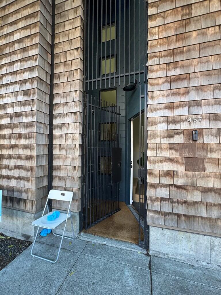 Location: Hayes Valley House, San Francisco, California, Wood Highlights: the entry vestibule stretches high up and is lined with dark blue painted siding and trim in contrast with the shingle exterior, marking the entry in a sophisticated and efficient way on the AIASF Home Tour