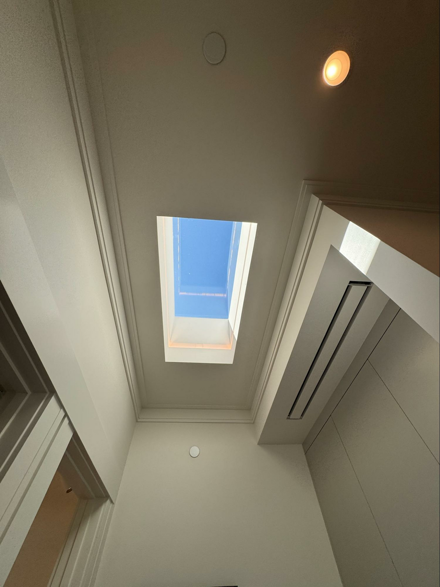 Wood Highlights: Built up crown moulding with an angular aesthetic provides continuity and a strong unique base for other elements to contrast and flourish nearby