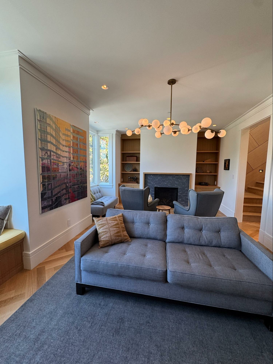 Location: Eureka Valley Home, San Francisco, California, Wood Highlights: High baseboards with a subtle but strong reveal coordinate with the stepped crown moulding to wrap the rooms in a modern treatment with a nod to tradition. Herringbone floors in a larger scale throughout the main level mark the common areas with pattern and movement.