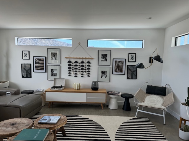 Location: Joshua Tree, California, Wood Highlights: A music room for playing favorite songs and deep listening builds with contemporary trim details including modern flat edge low baseboards.