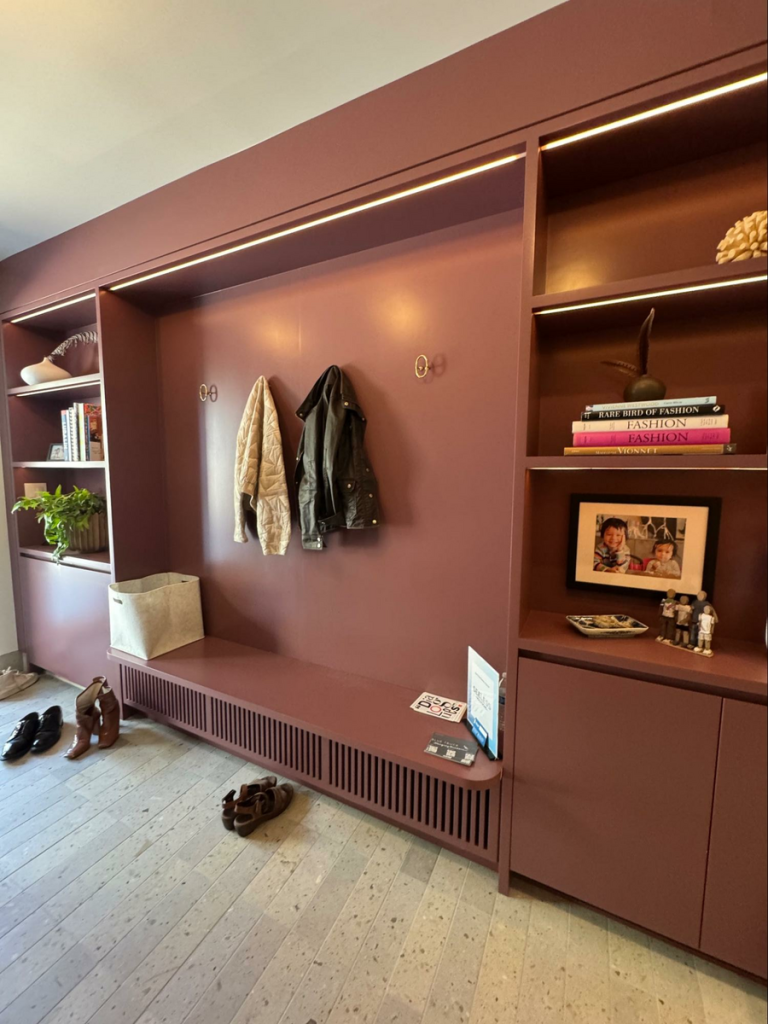 Location: San Francisco, California, Wood Highlights: A thoughtful, durable mudroom offers ample storage for outerwear, sports equipment, school backpacks, leashes, shoes and more with refined moulding placement to set the tone in a unique plum color.