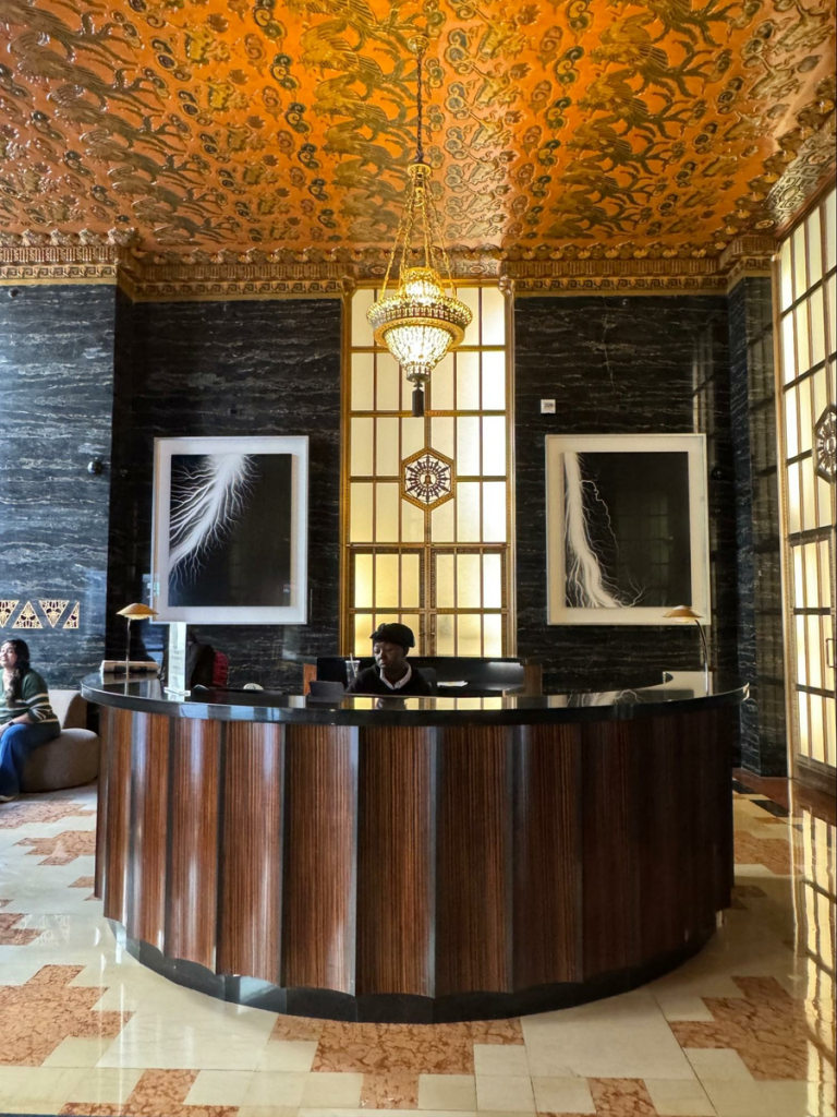 Location: San Francisco, California, Wood Highlights: The entry is marked with history and a remarkable circular reception desk featuring large scale moulding across the front.